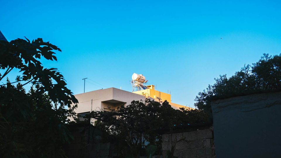 Radar antenna installation against the sky representing search and tracking radar modes.